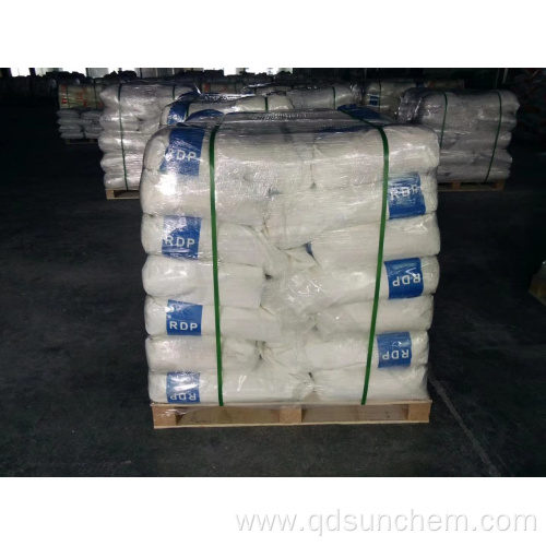 Cement additive redispersible powder